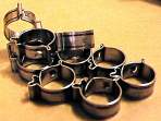 Re-useable clips used to fasten both beer and gas line to the tail pieces.